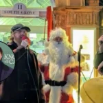 Rupert Grint switches on Highgate Christmas lights in North London